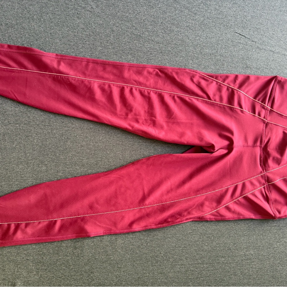 Nike Dri-FIT Yoga Leggings in Red